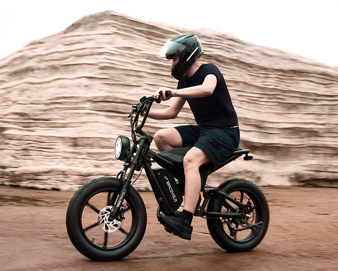 Powerful 750W(peak 1200w) E-Bike with 100+ Mile Range for Ultimate Riding Freedom Experience unmatched performance with this premium e-bike featuring a robust 750W(peak 1200W) motor (95Nm torque) that conquers steep hills with ease. The long-range 100+ mile battery eliminates range anxiety, making it perfect for extended commutes and weekend adventures. Built for all terrains, the fat tires provide exceptional stability on city streets, gravel paths, and dirt trails. The intuitive pedal-assist system ensure