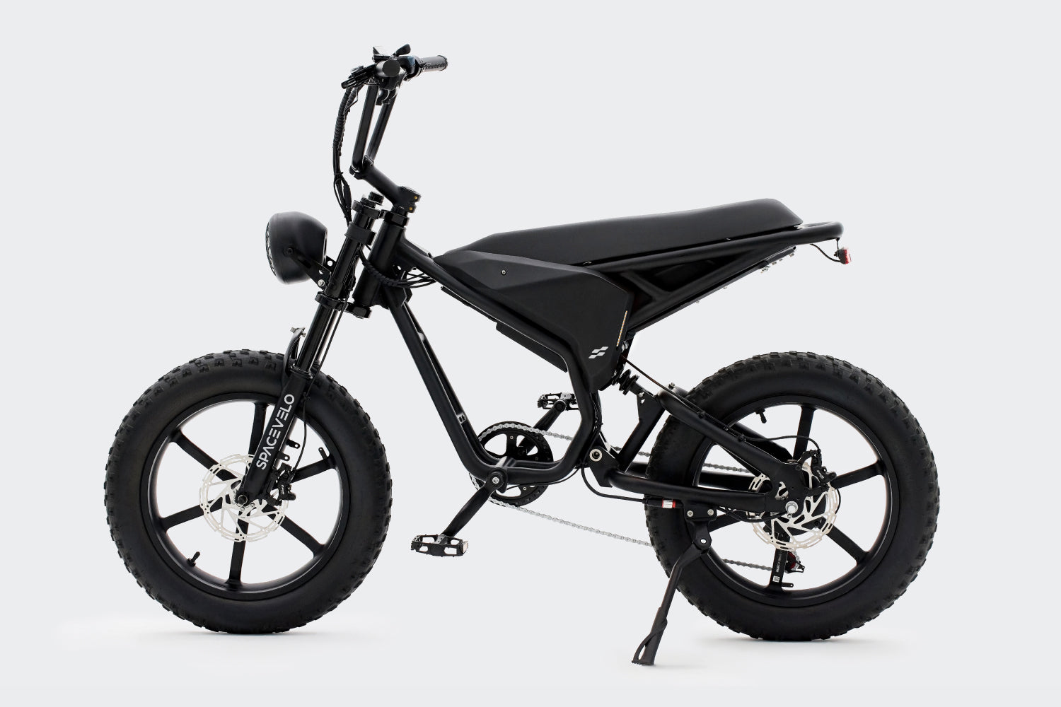 Full profile view of the SPACEVELO Blitz S1 electric bike in black, featuring fat tires and a robust design ideal for versatile terrains.