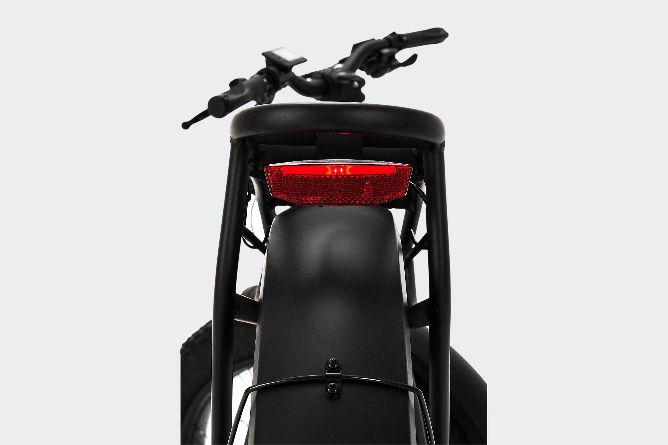 Rear light detail on the Terra X1 grey electric bike, highlighting safety features and modern design.