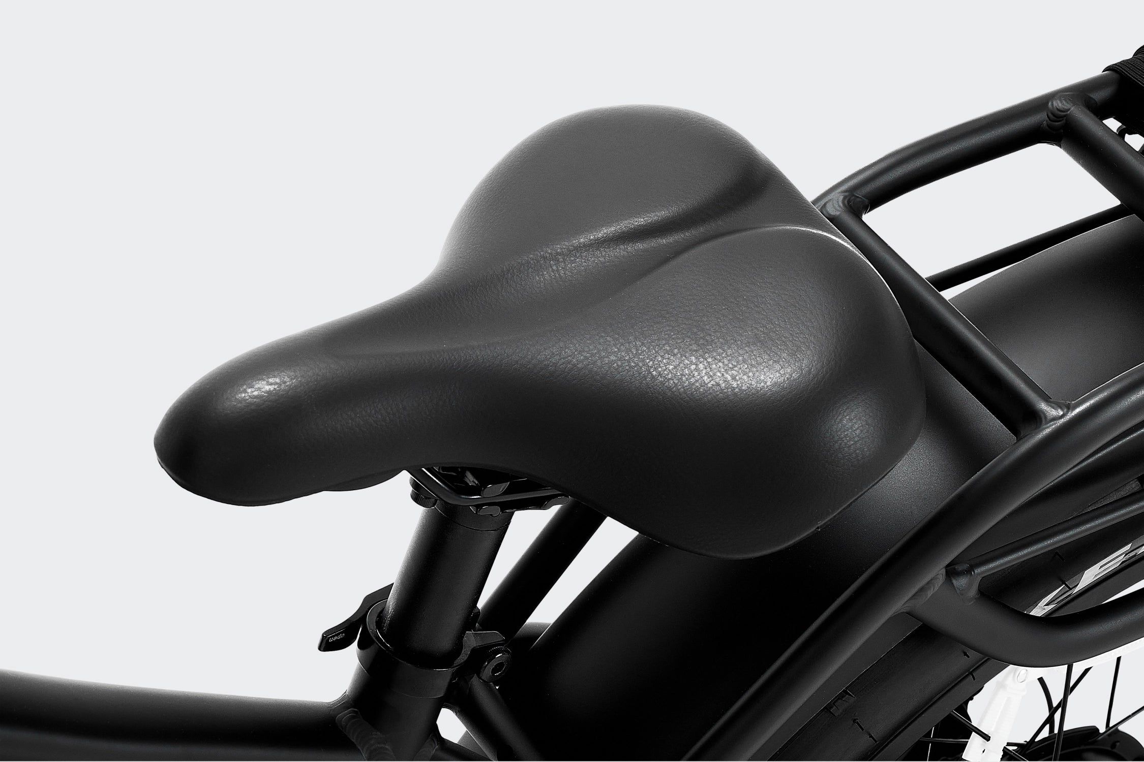 Saddle detail of the Terra X1 grey electric bike, showcasing comfortable seating for enhanced riding experience.