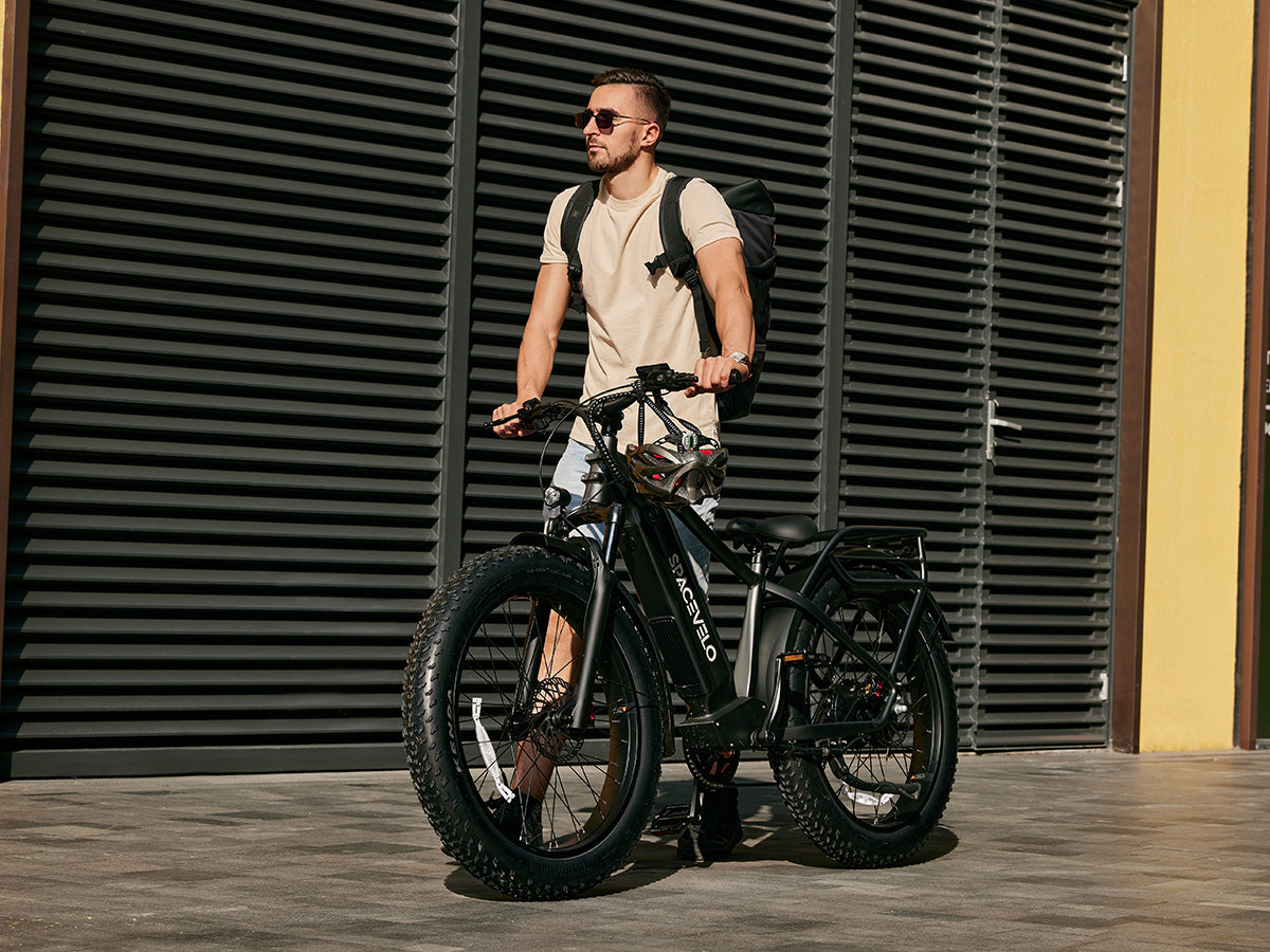 The SPACEVELO Terra X1 is a premium all-terrain electric bike built for adventure and daily commuting. Powered by a robust 48V 750W rear hub motor with 90N.M torque, it delivers smooth acceleration on any terrain. The high-capacity 48V 20Ah LG battery provides an impressive 60-mile range per charge. Featuring 120mm hydraulic suspension, 26x4.0" Kenda fat tires, and Zoom hydraulic disc brakes, it handles city streets and off-road trails with ease. Practical features include a 150LB rear rack capacity, 8-spee