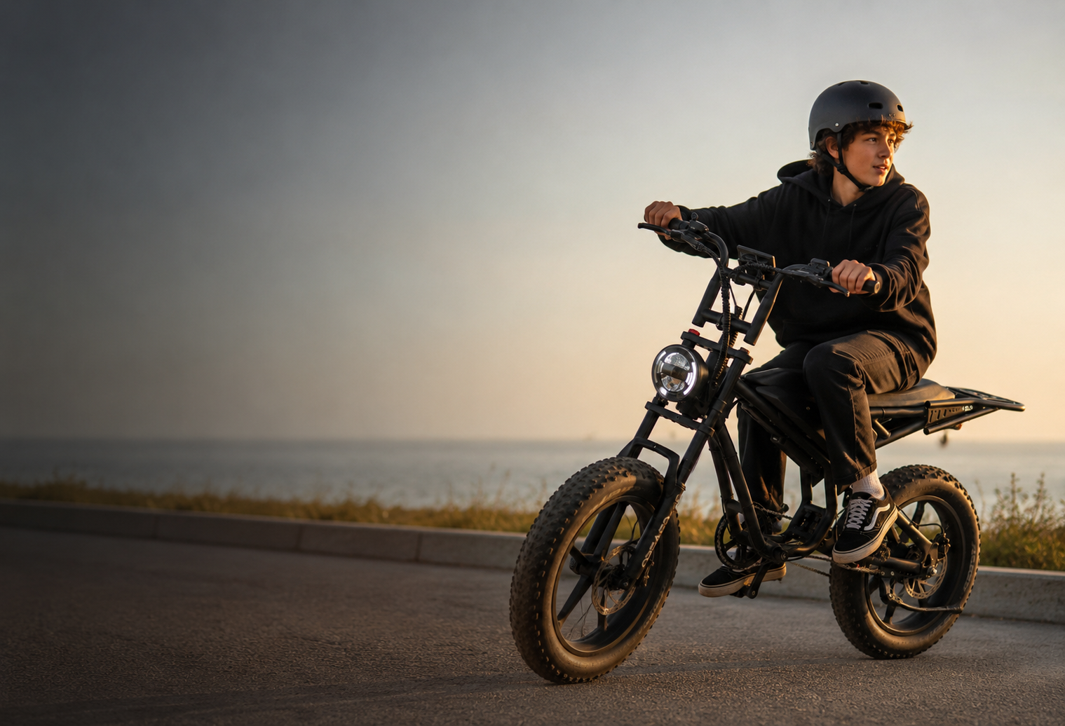 Spacevelo Blitz S1 full suspension fat tire electric bike with rider at dusk